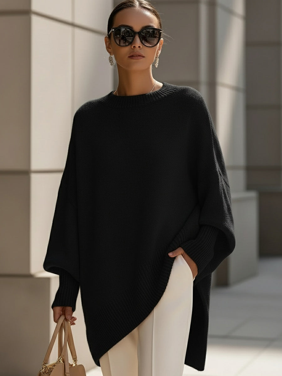 Jennifer Oversized Asymmetrical-Hem Sweater in Black